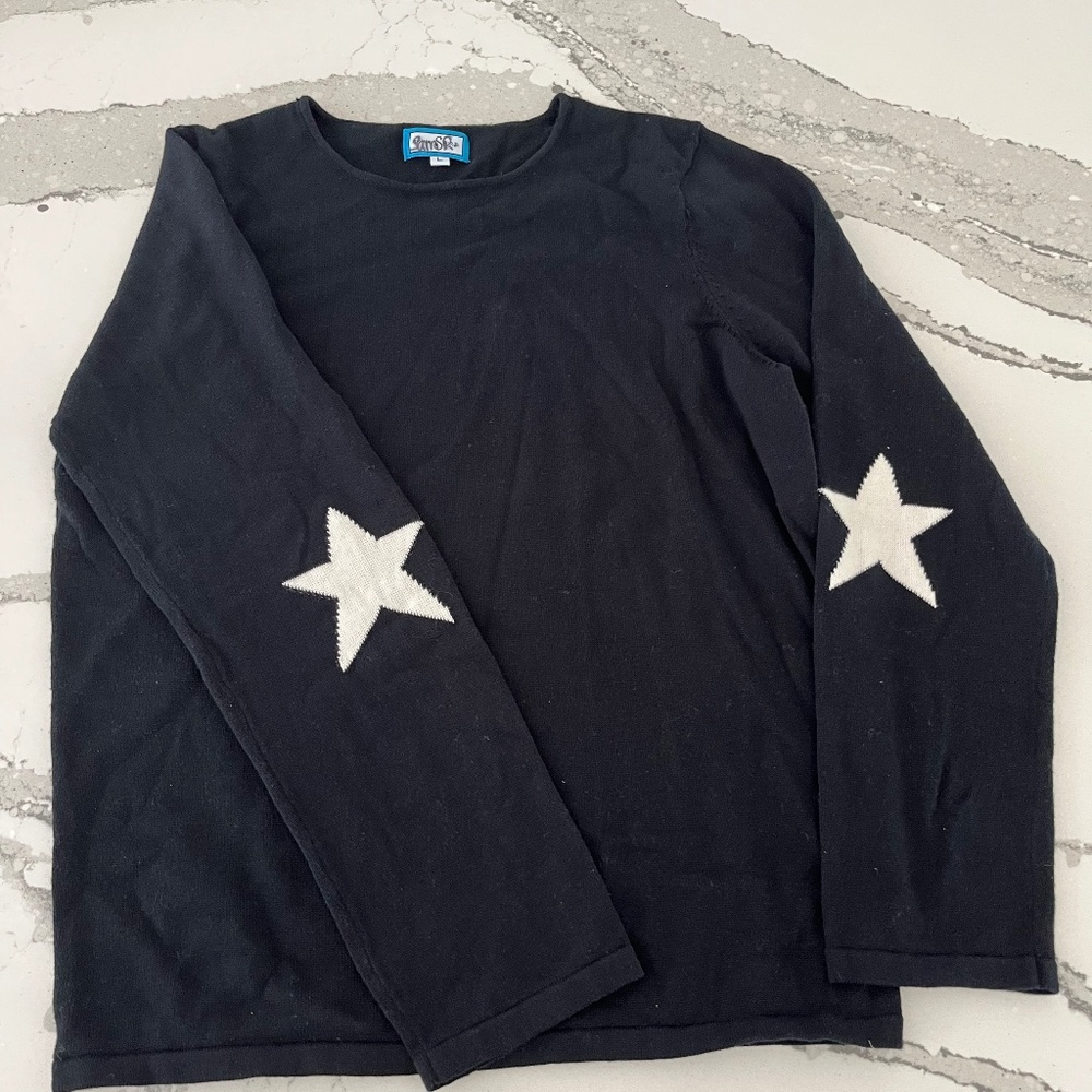 Black Sweater with White Star on Sleeves